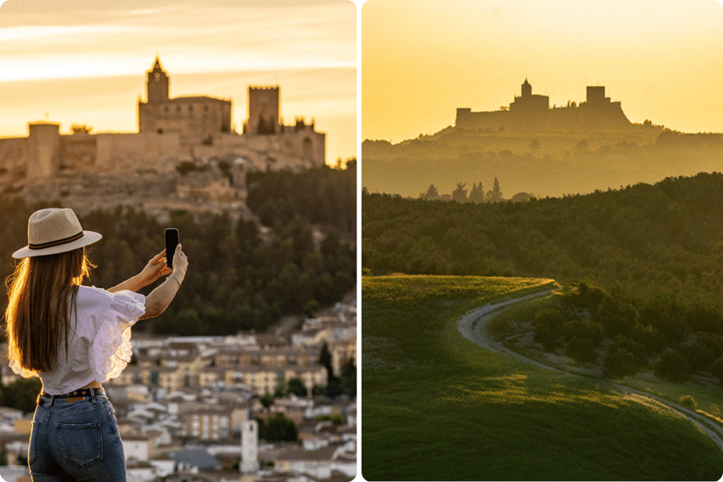 Una mujer con sombrero se hace un selfi con un castillo en lo alto de una colina al atardecer; junto a él, un sinuoso sendero conduce a un castillo lejano que se recorta contra un cielo dorado.