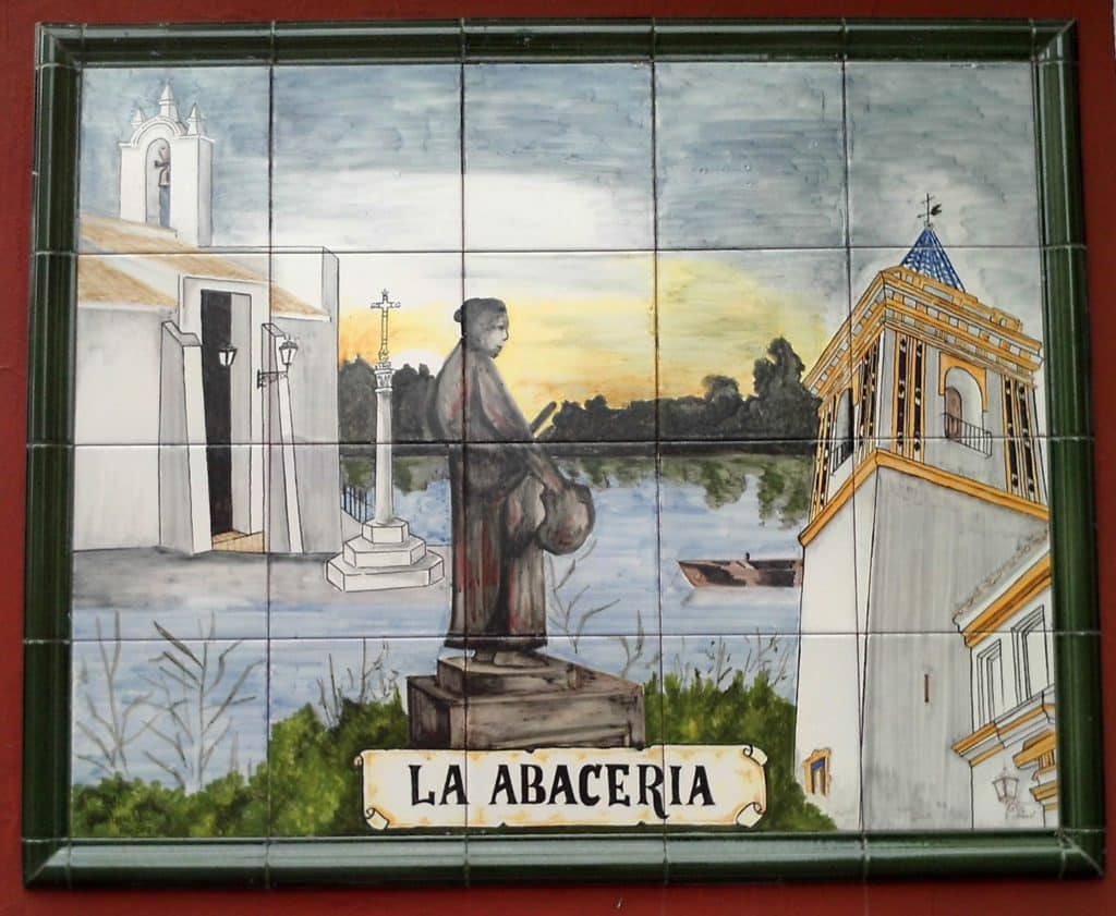 Azulejo en el exterior del restaurante La abacería de Coria del Río